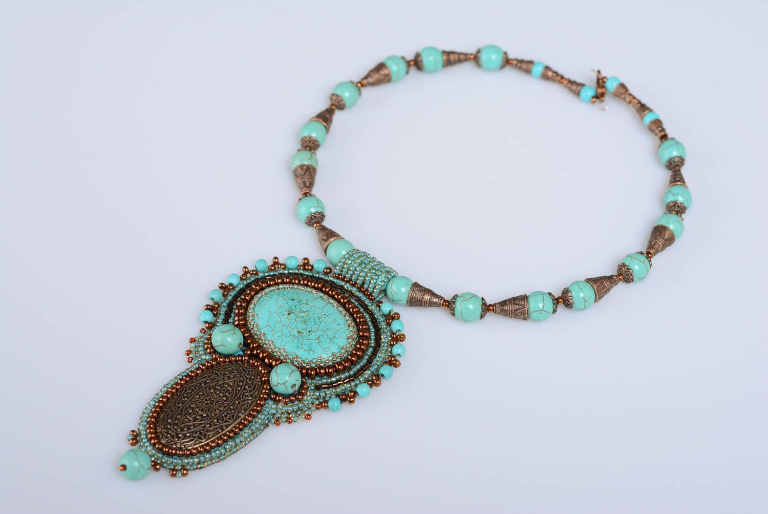 Handmade designer massive necklace embroidered with beads with natural howlite photo 1