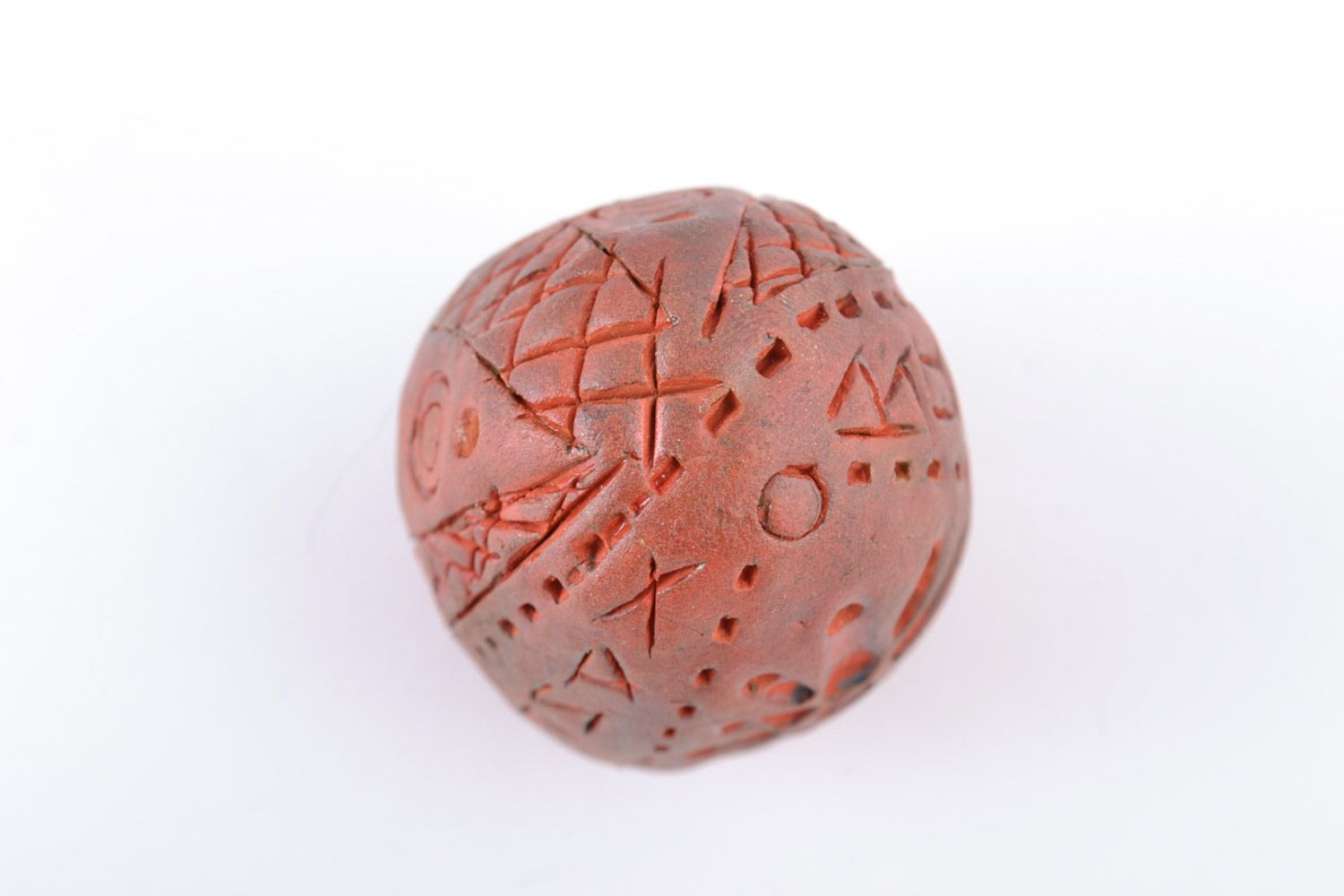 Handmade small decorative ornamented egg of brown color molded of red clay  photo 4