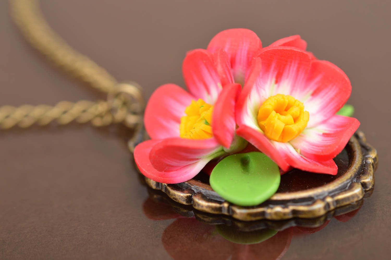 Handmade stylish pendant made of polymer clay on chain with pink flowers photo 4