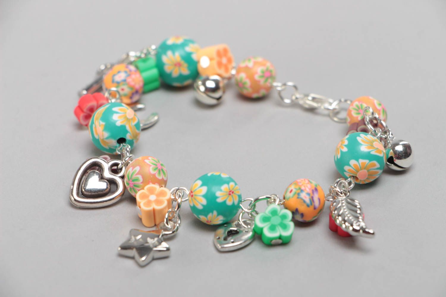Beautiful children's designer handmade polymer clay bracelet with charms photo 2