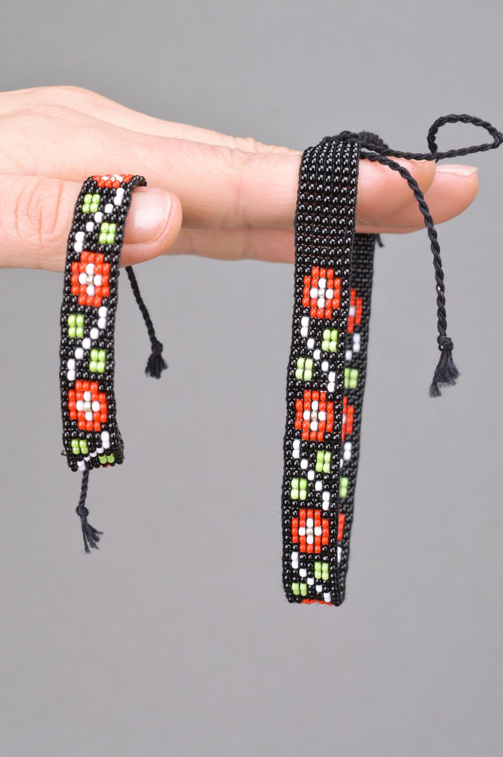 Handmade bracelet with ties and necklace woven of Czech beads with red flowers photo 3