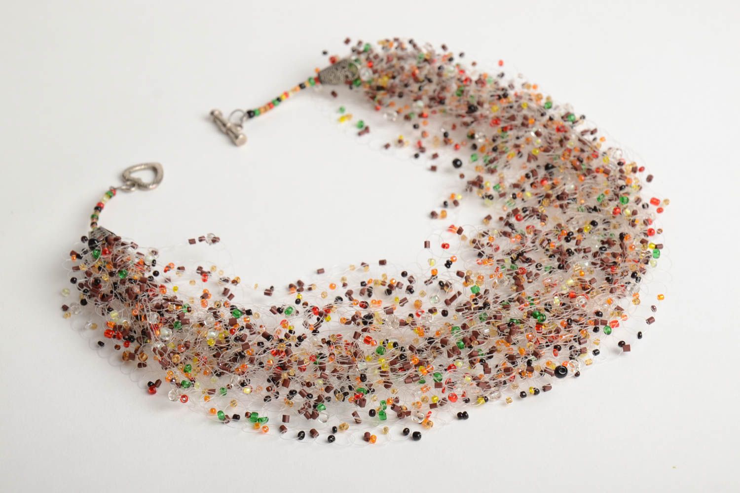 Сollier multicolore tissé en perles de rocaille fait main avec fermoir toggle photo 3