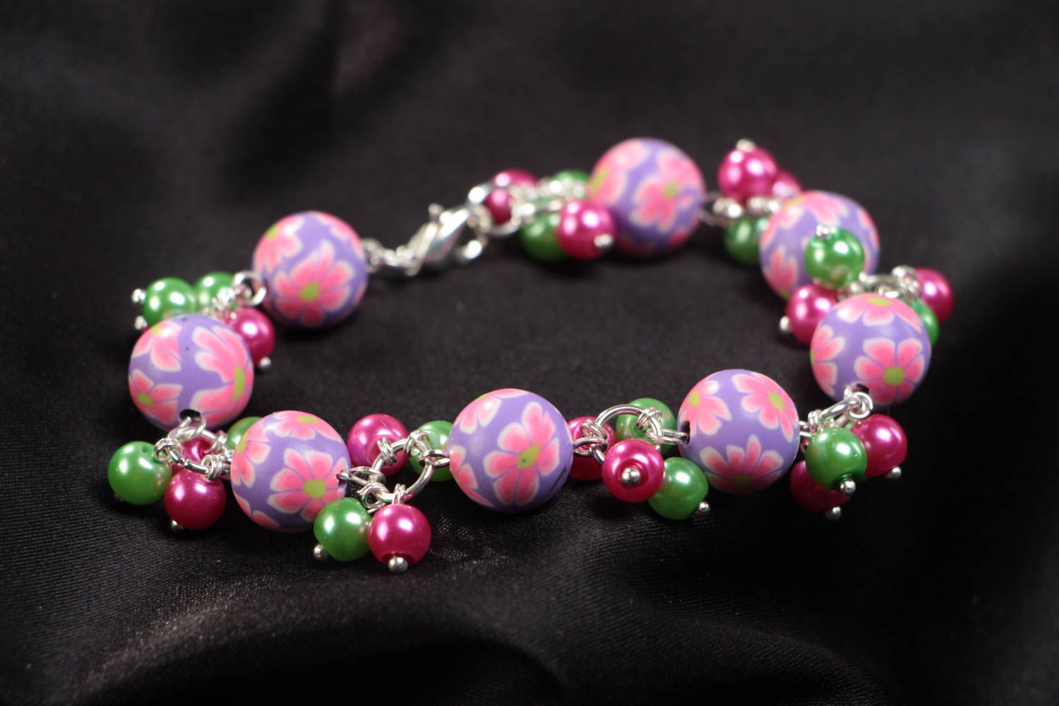 Handmade children's wrist bracelet with polymer clay beads and ceramic pearls photo 1