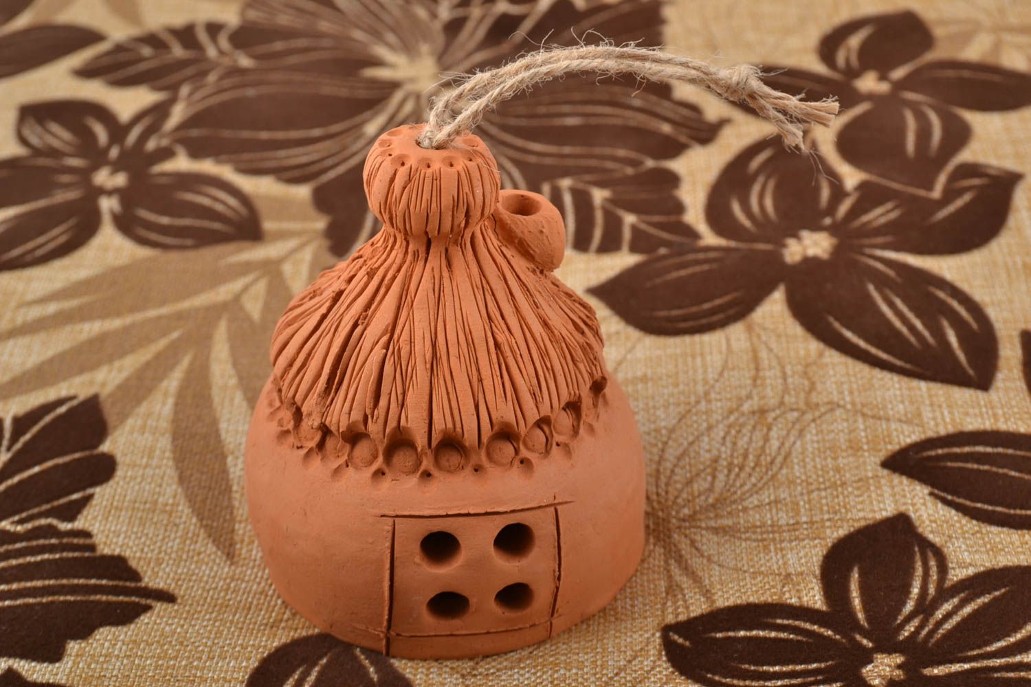 Designer ceramic figured bell handmade of red clay with a cord for hanging photo 1