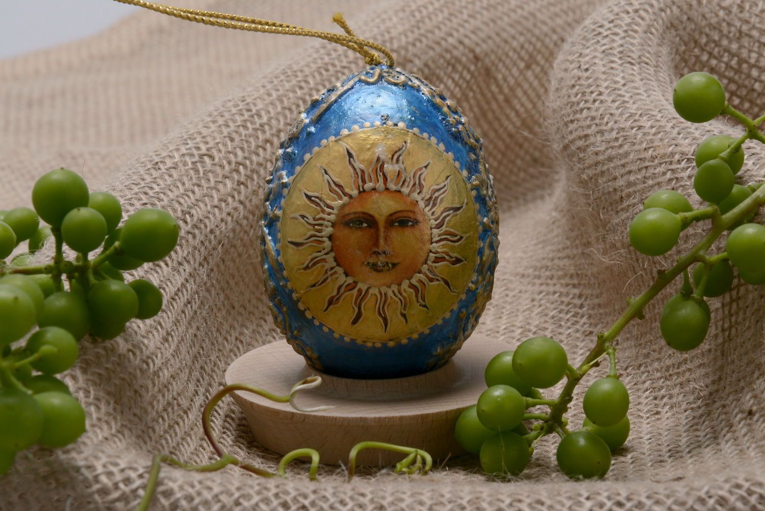 Pingente-ovo decorativo Cristo e sol foto 1