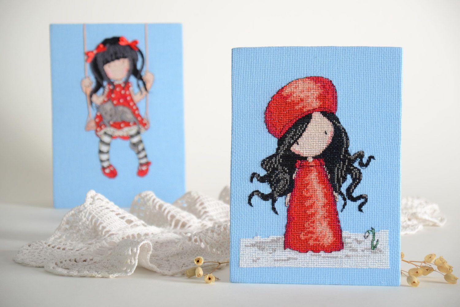 Handmade small embroidered picture with girl in red dress on blue background photo 1