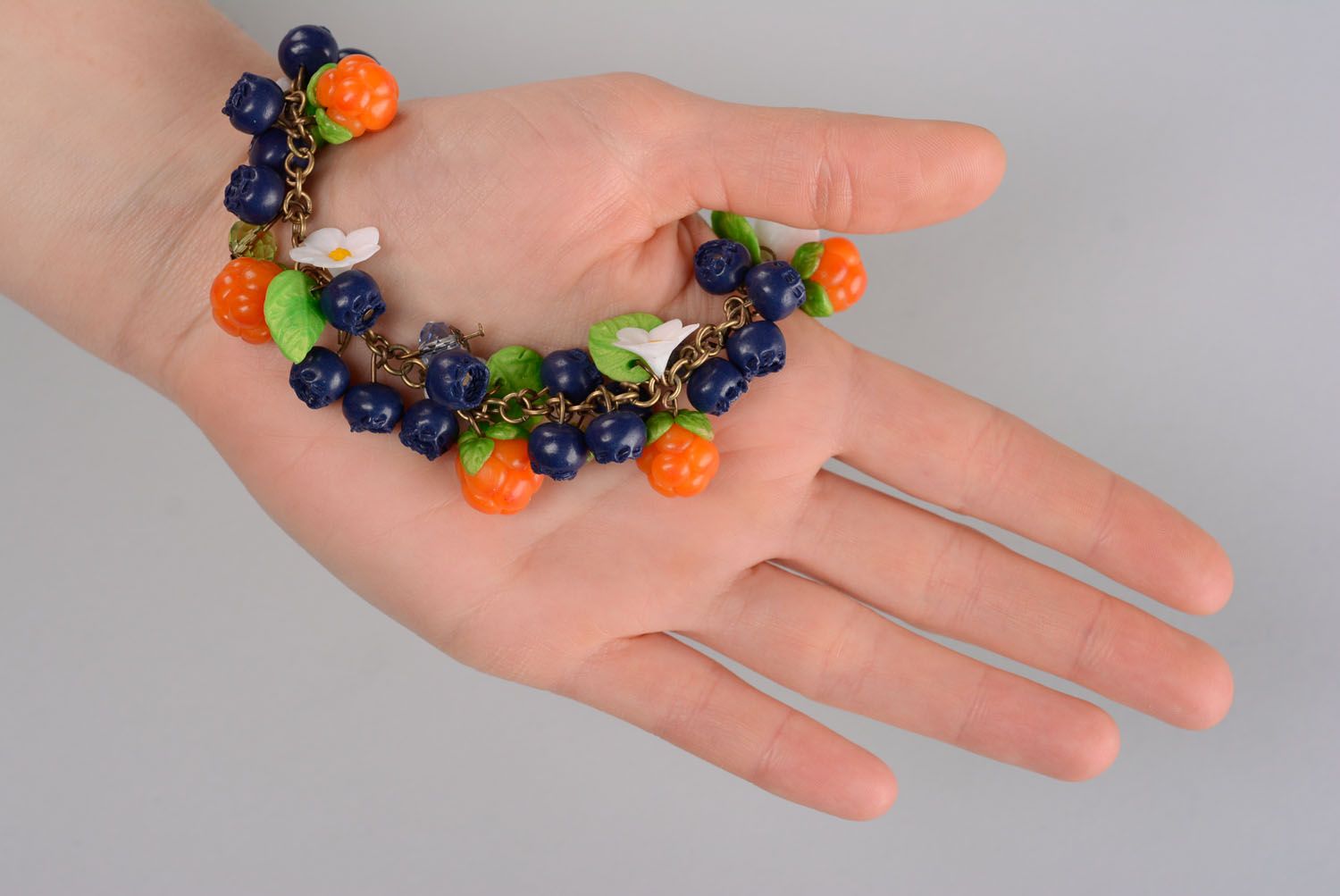 Plastic bracelet with flowers and berries photo 2