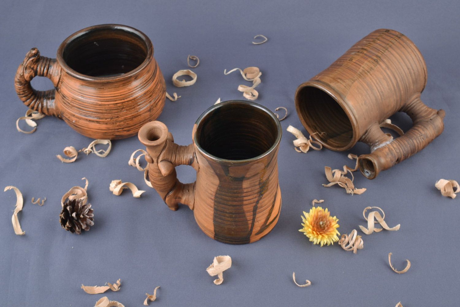 Set of three clay handmade brown drinking cups in different design and shape with handle, 8 oz. 10 oz, 12 oz photo 1