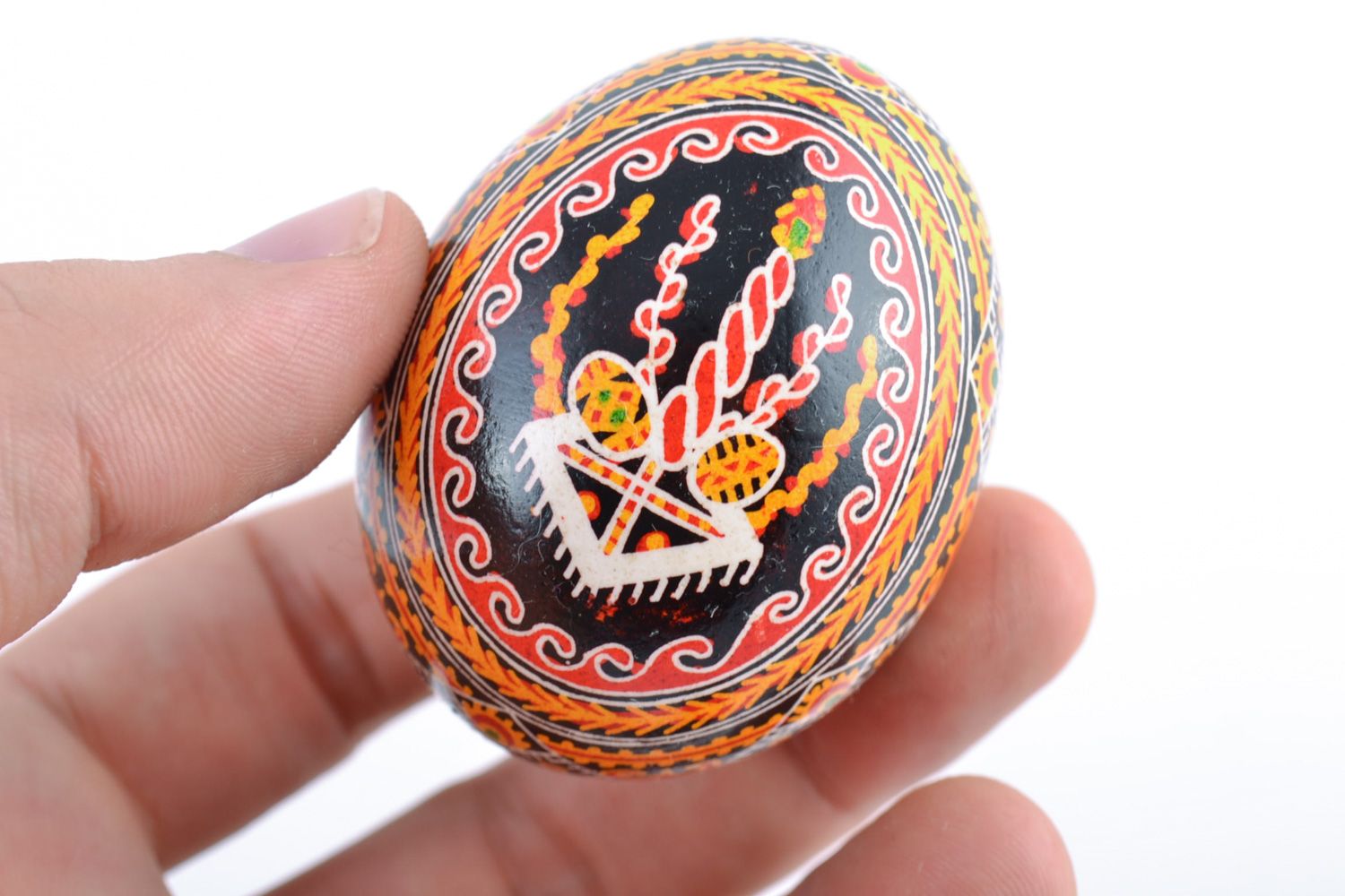 Bright multi-colored handmade painted chicken egg with church image for Easter photo 2
