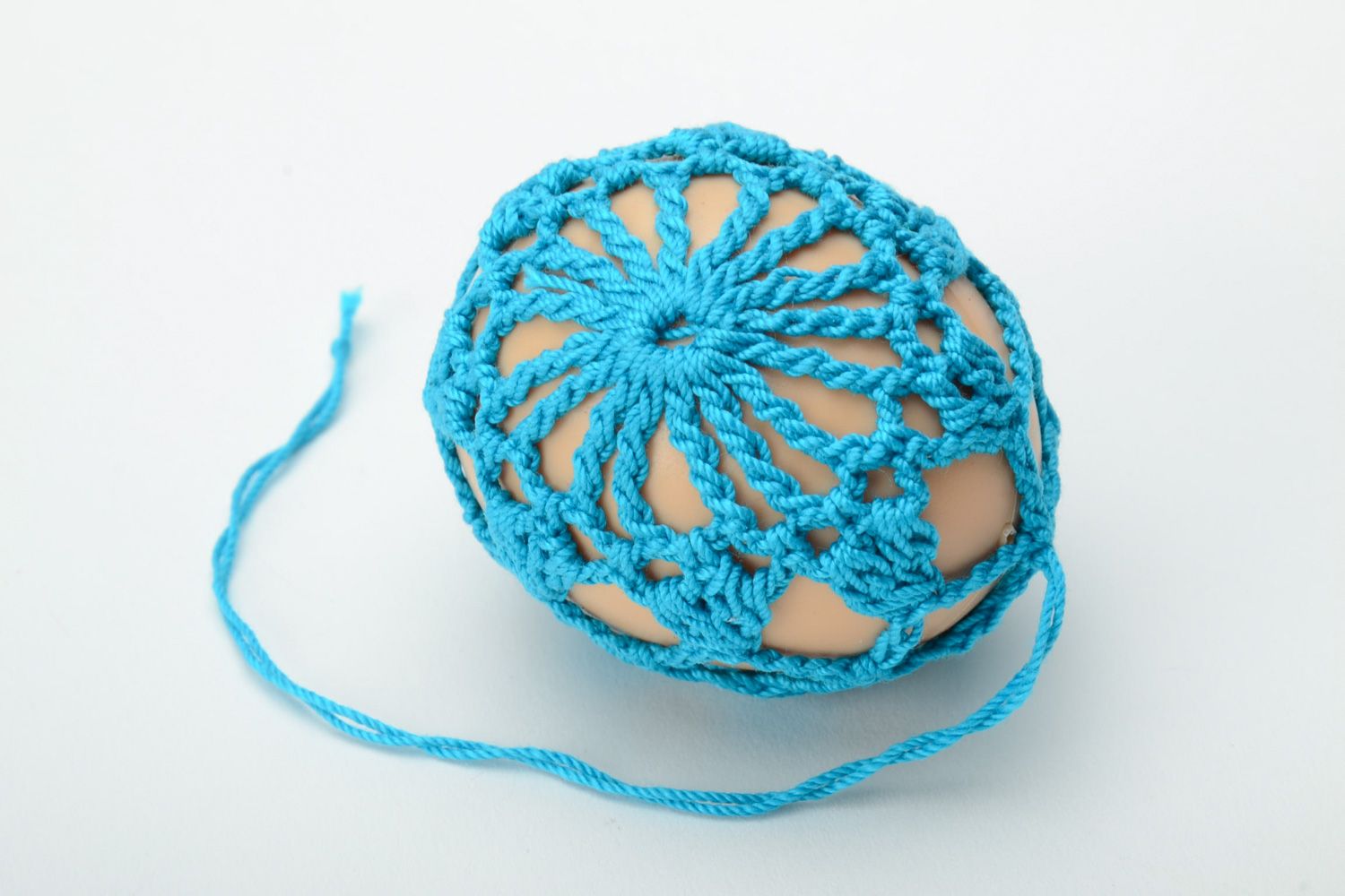 Homemade blue Easter egg crocheted over with cotton threads photo 3