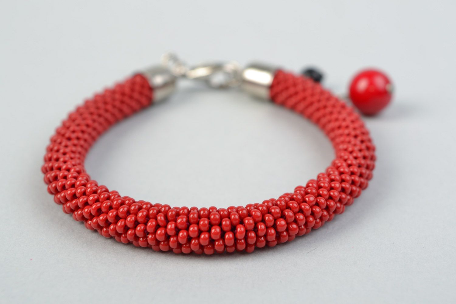 Handmade bright red beaded cord women's wrist bracelet with glass beads photo 3