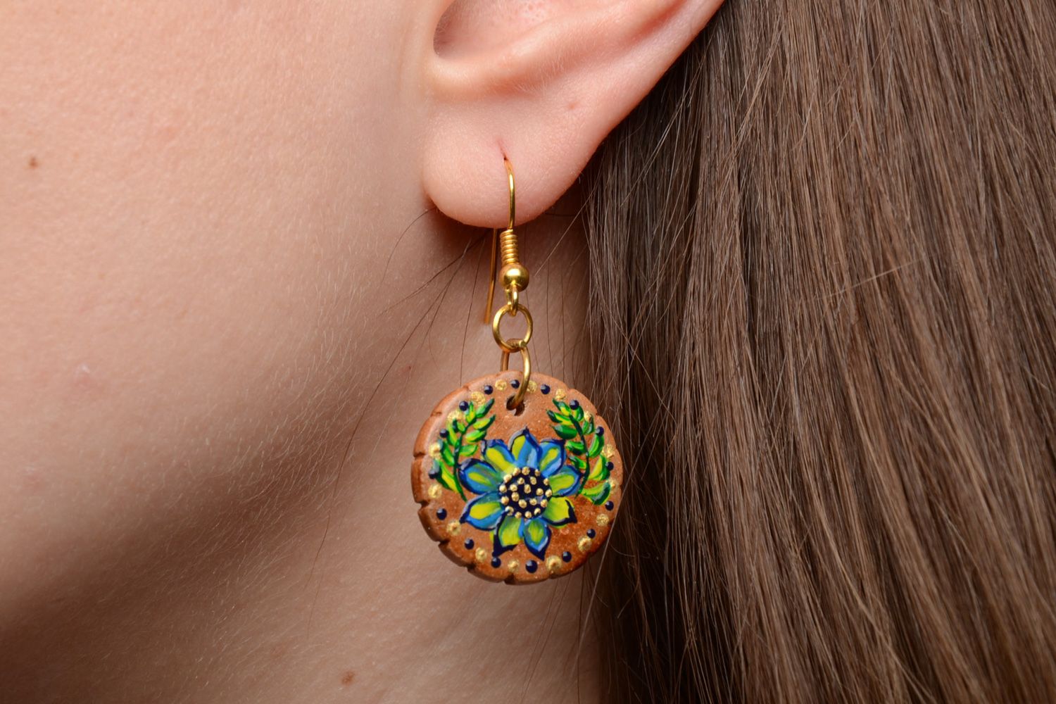 Handmade festive round ceramic earrings painted with acrylics in ethnic style photo 2