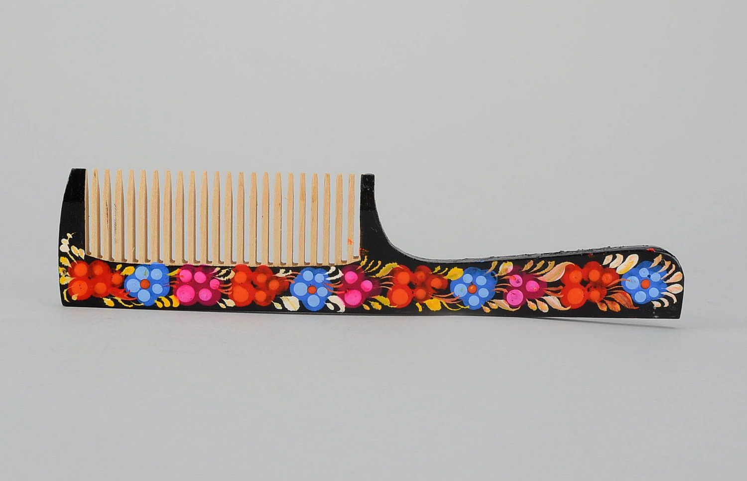 Wooden comb with painting photo 4