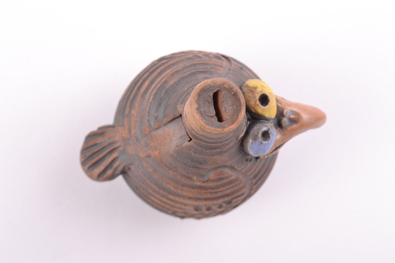 Figura cerámica artesanal con forma de corneja estilizada foto 4