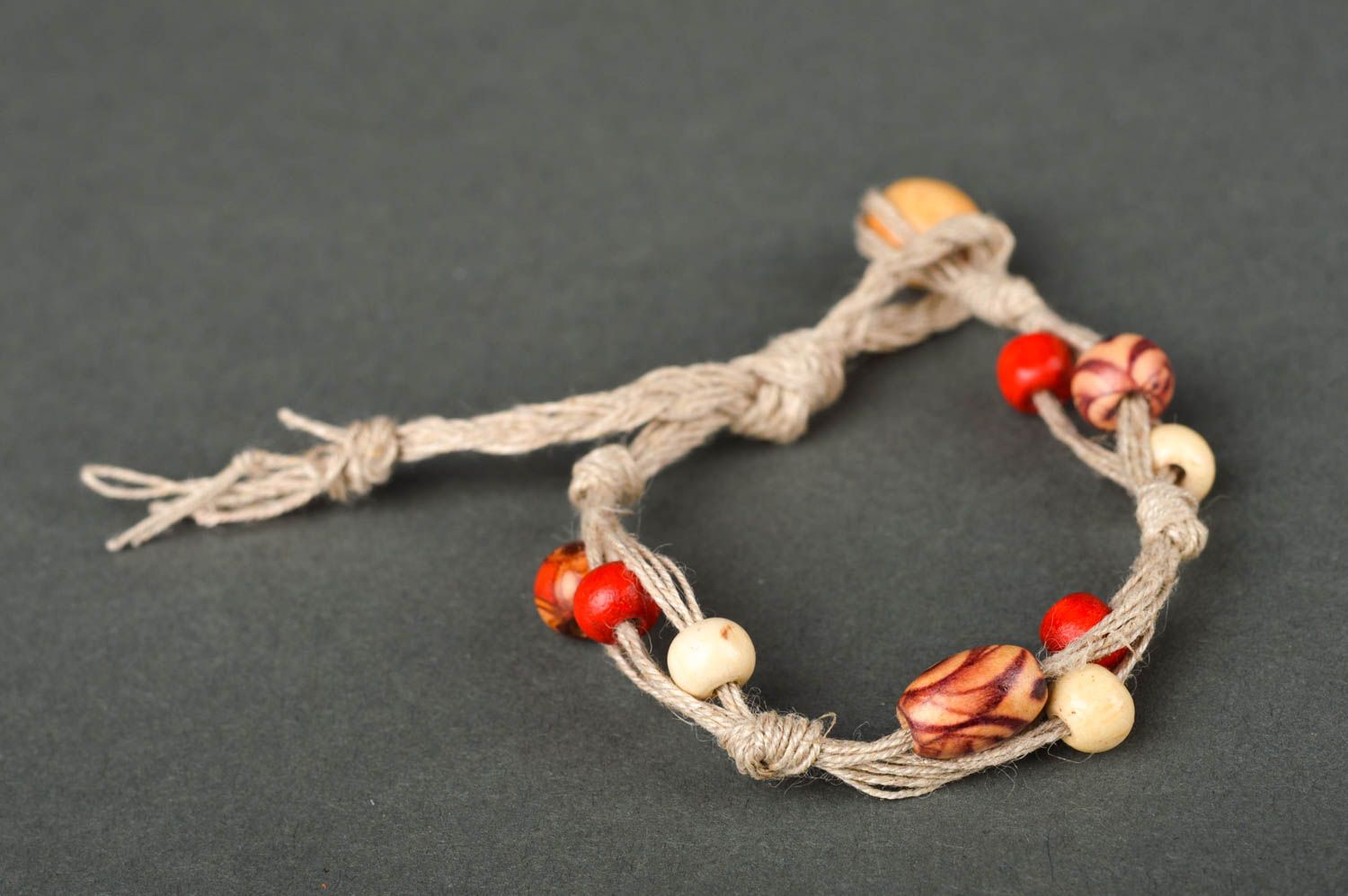 Strand rope handmade beaded bracelet with wooden red and beige beads for her photo 3