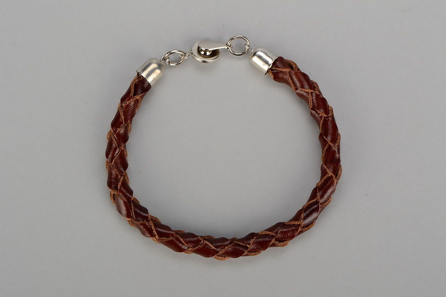 Round braided bracelet of brown color photo 3
