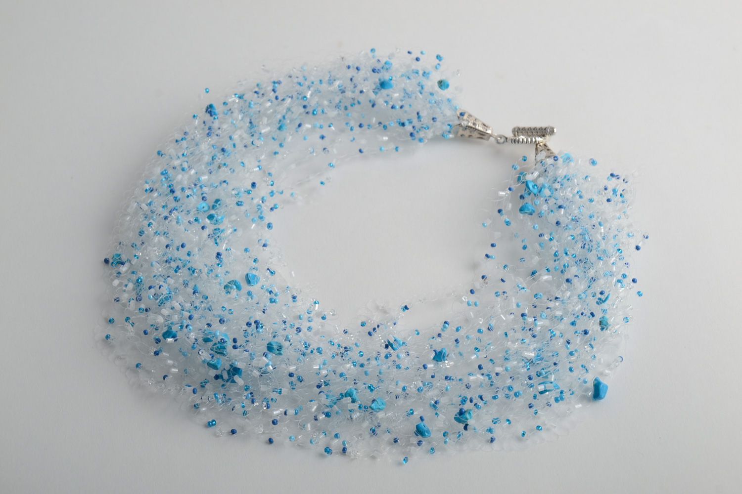Handmade volume airy necklace woven of beads and fishing line in blue color photo 2
