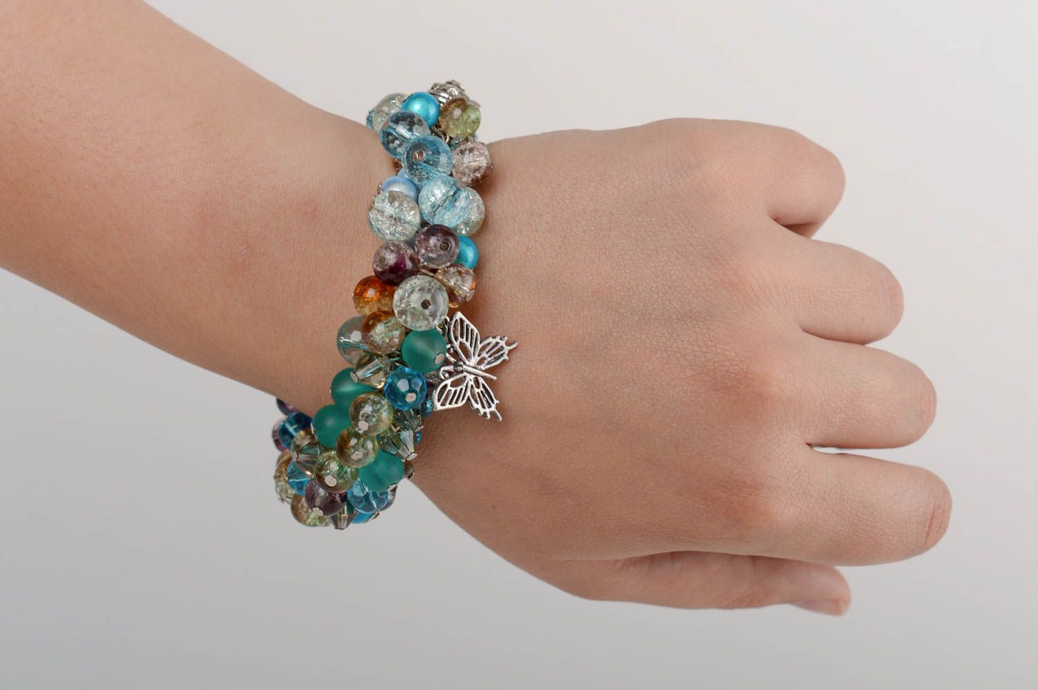 Handmade festive beautiful bracelet made of crystal and glass with charms photo 5