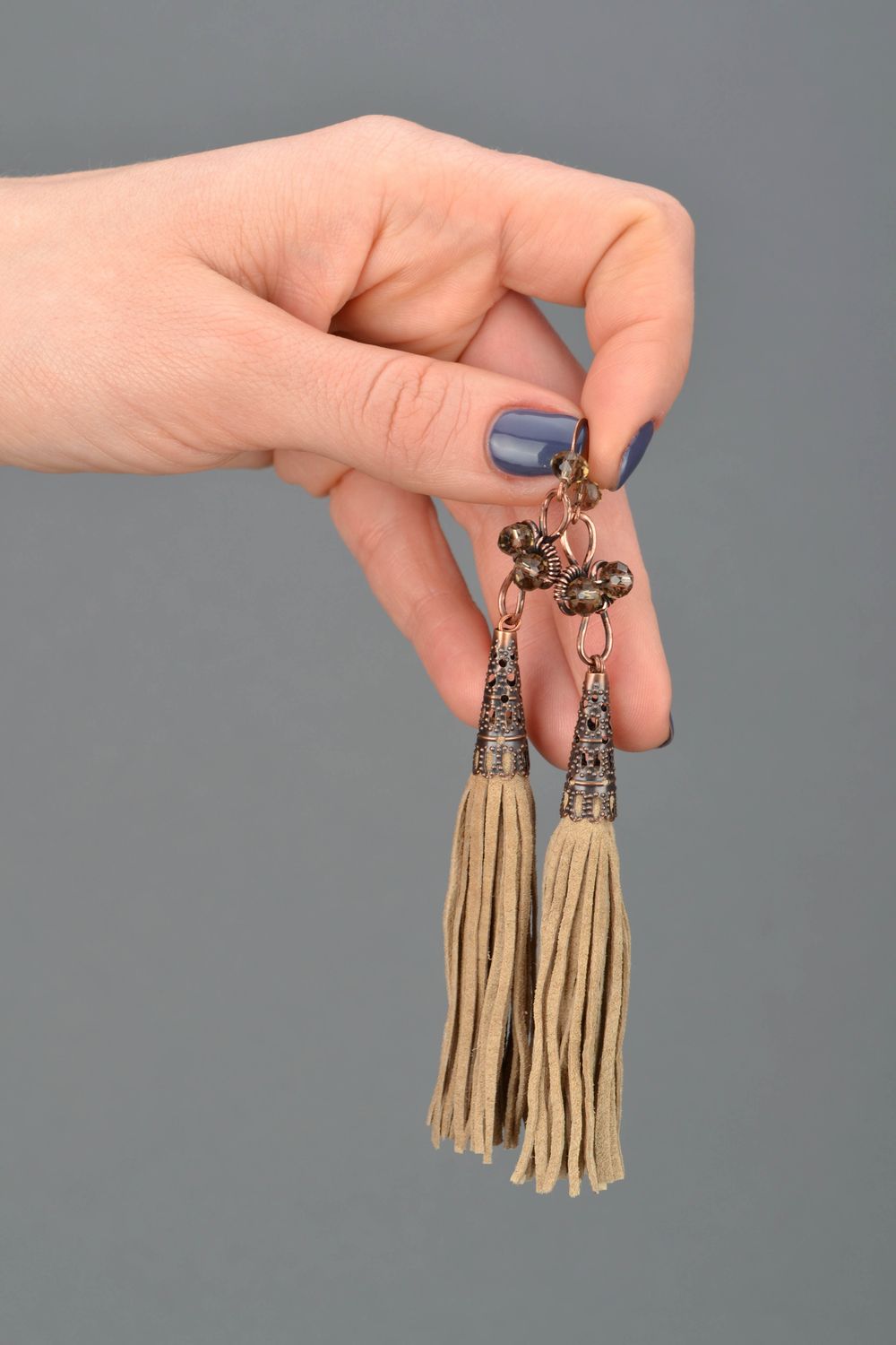Wire wrap copper earrings with leather fringe of beige color photo 2