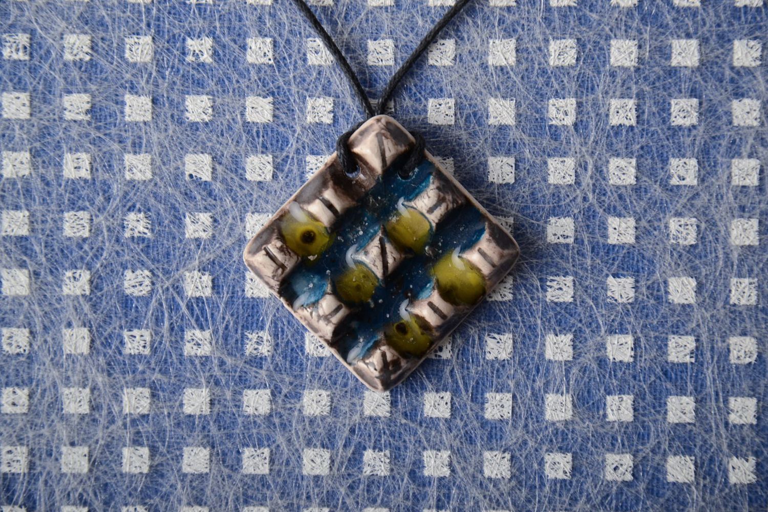 Handmade clay pendant with cord photo 1