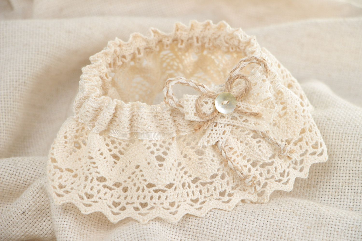 Beautiful vintage handmade wedding bridal garter with ivory-colored lace and bow  photo 1