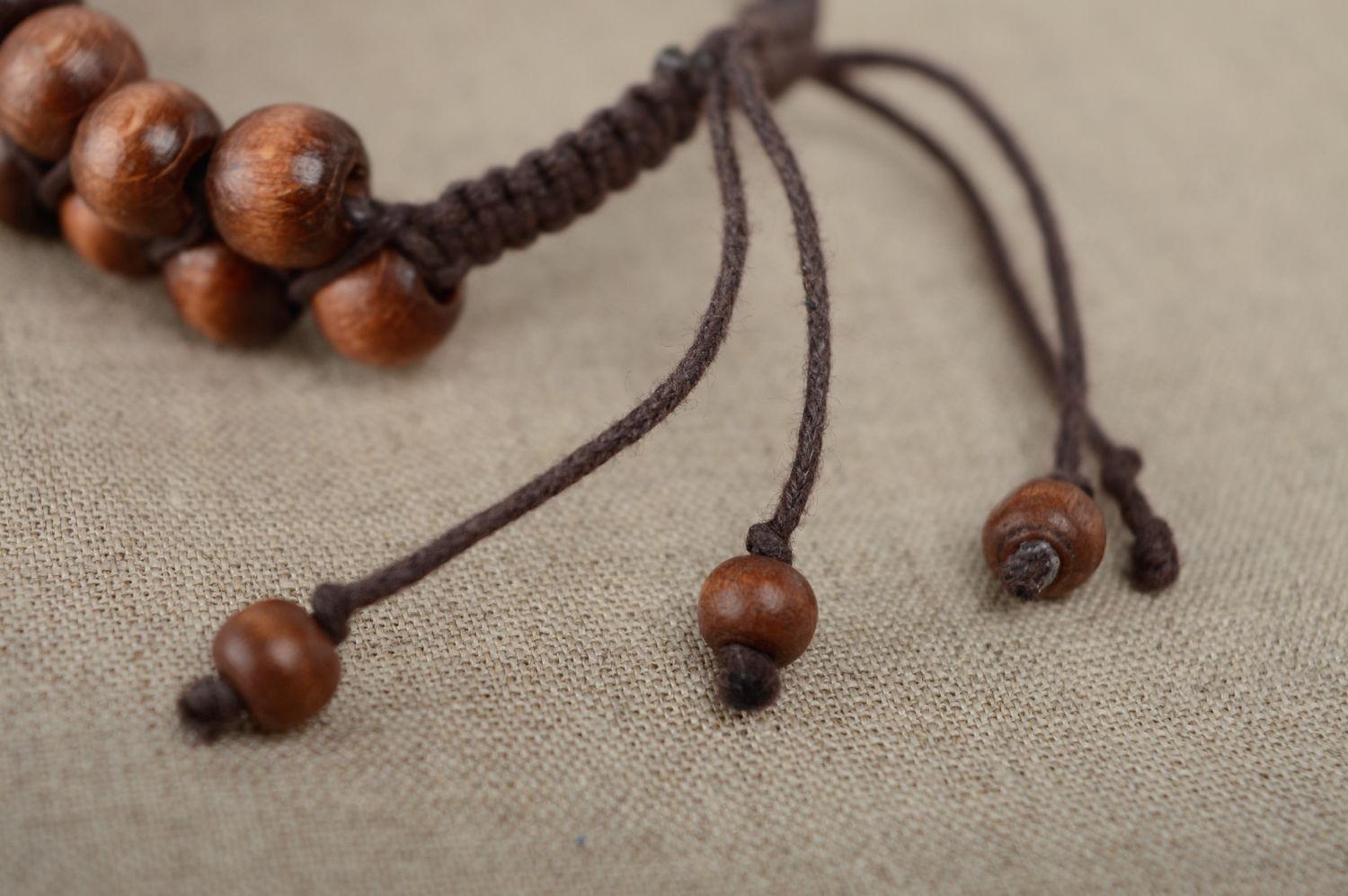 Unusual brown bracelet made of cord and beads photo 4