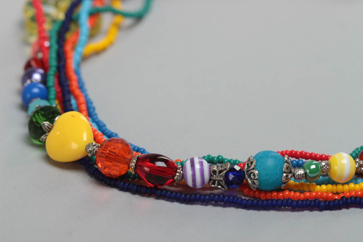Beautiful handmade children's beaded necklace with glass and plastic beads photo 3