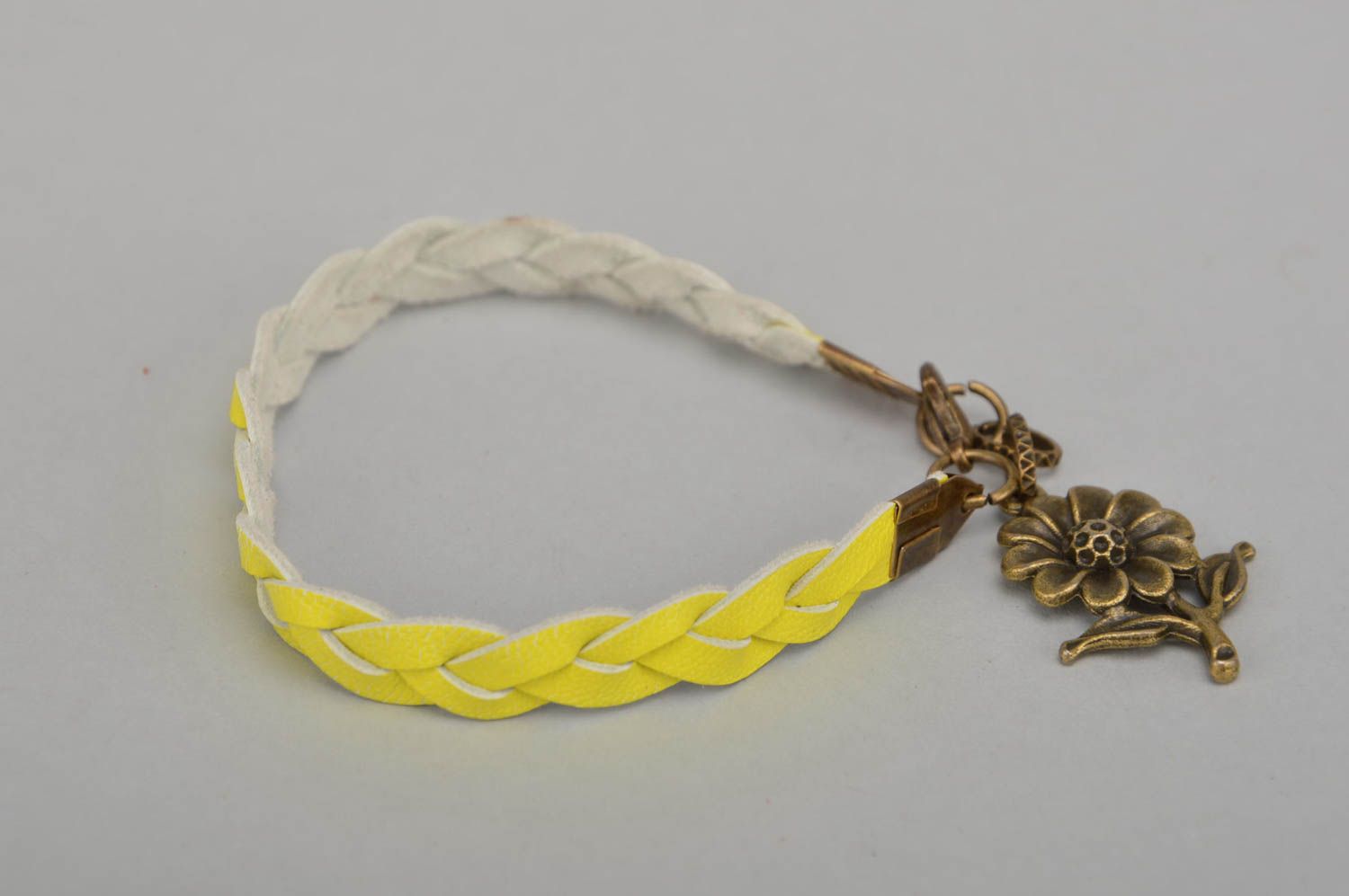 Handmade designer yellow genuine leather woven wrist bracelet with charm photo 5