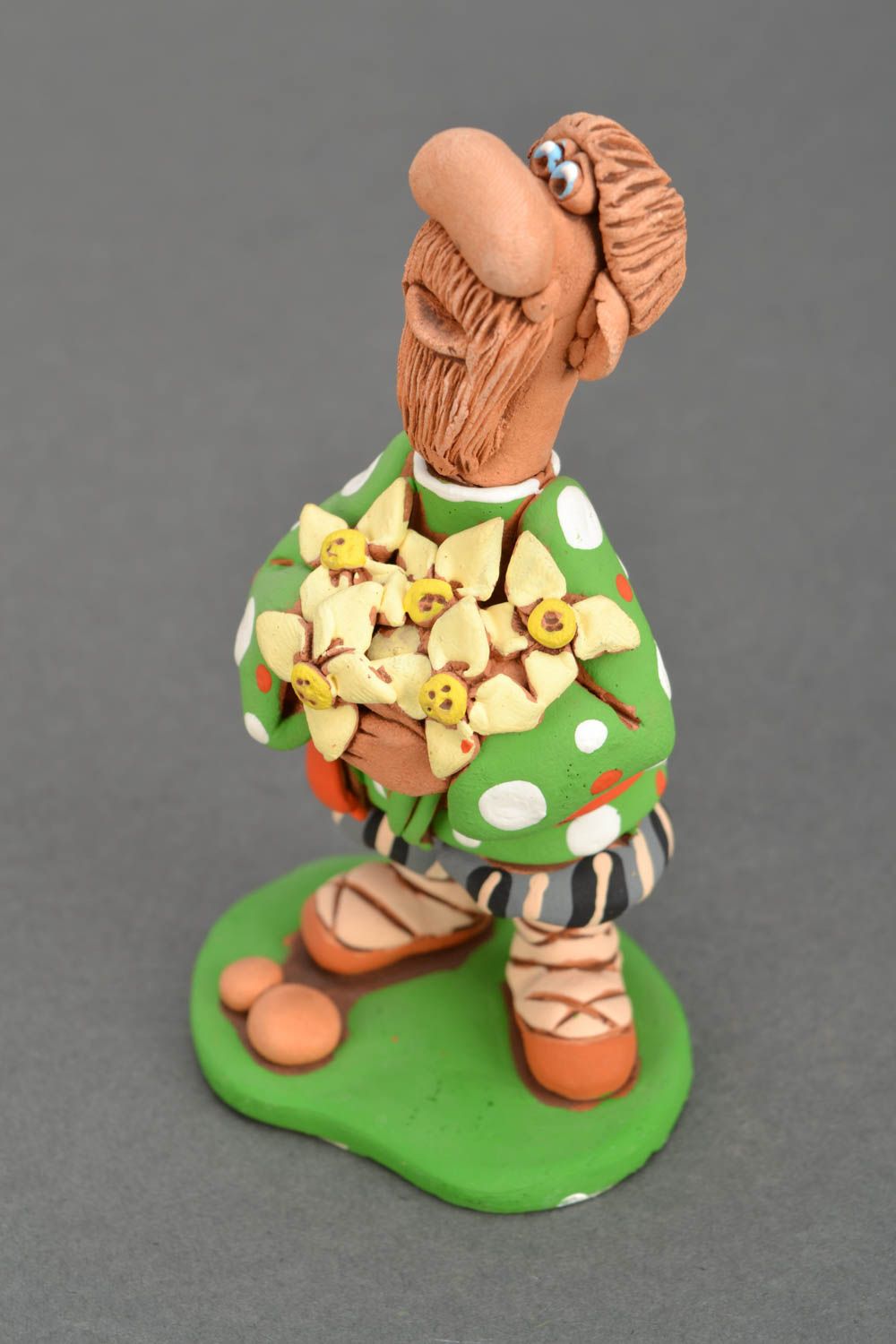 Figurine aus Ton Kosak mit Blumen  foto 3