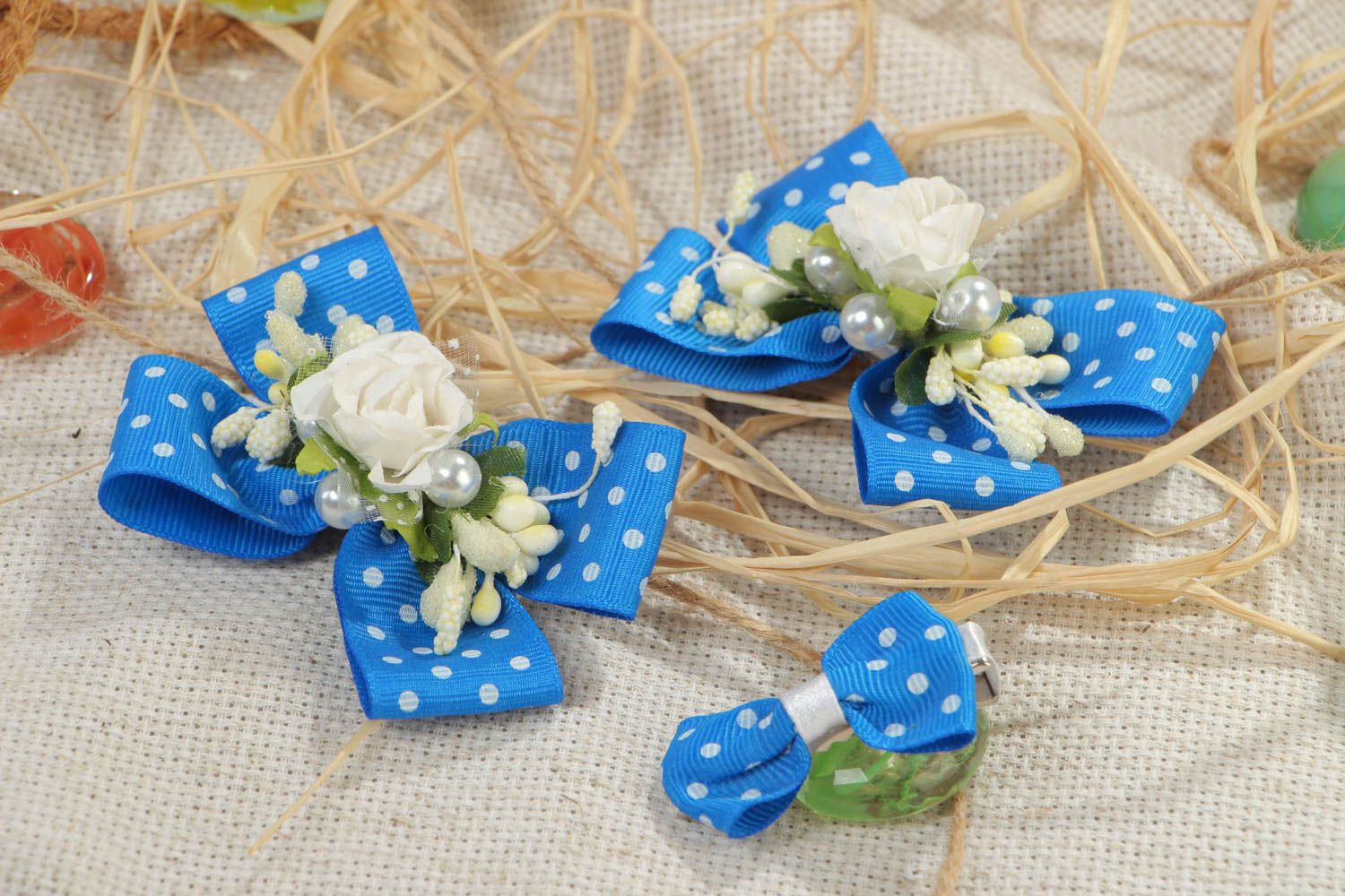 Set of 3 handmade hair clips with bright blue white dotted rep ribbon bows photo 1