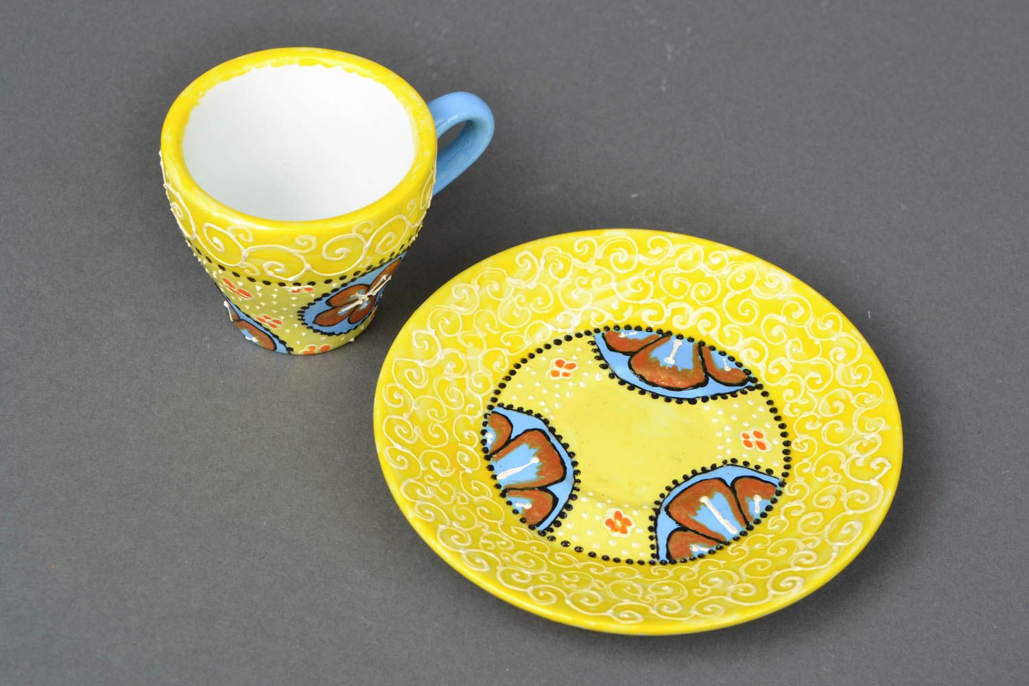 Small 2 oz yellow hand-painted coffee cup with blue handle and flower pattern photo 3