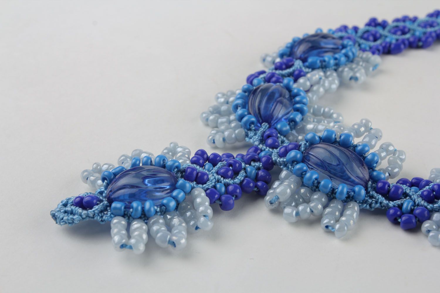 Parure de bijoux de perles de rocaille bleues photo 4