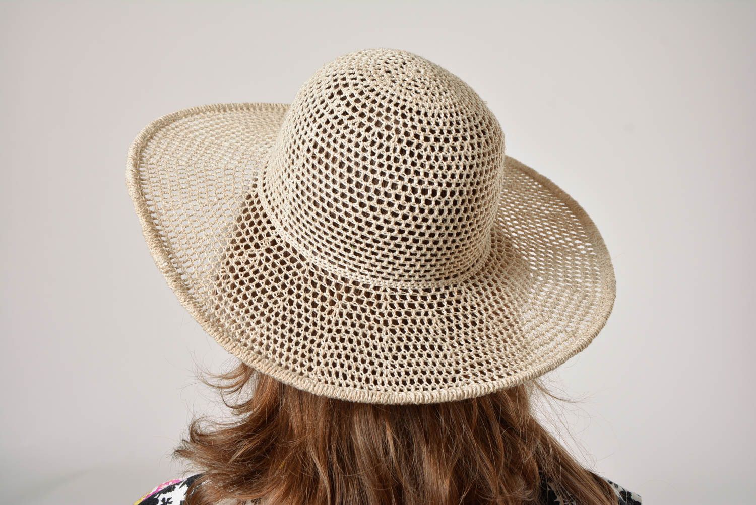 Designer openwork knitted hat made of linen handmade summer light accessory photo 1