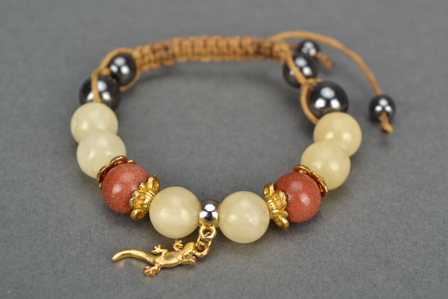 Bracelet with natural stones and cord photo 3