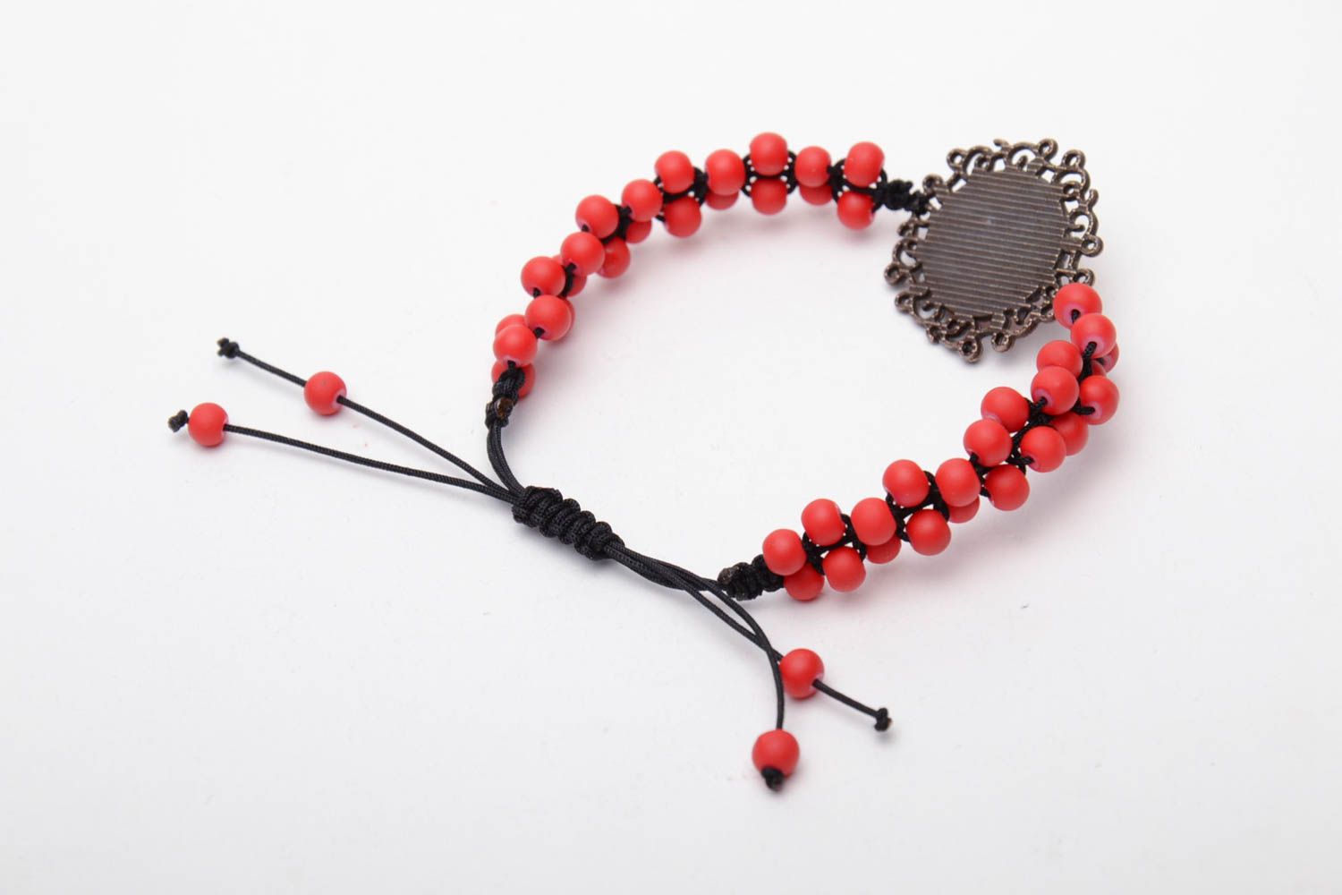 Red bracelet woven of beads photo 4