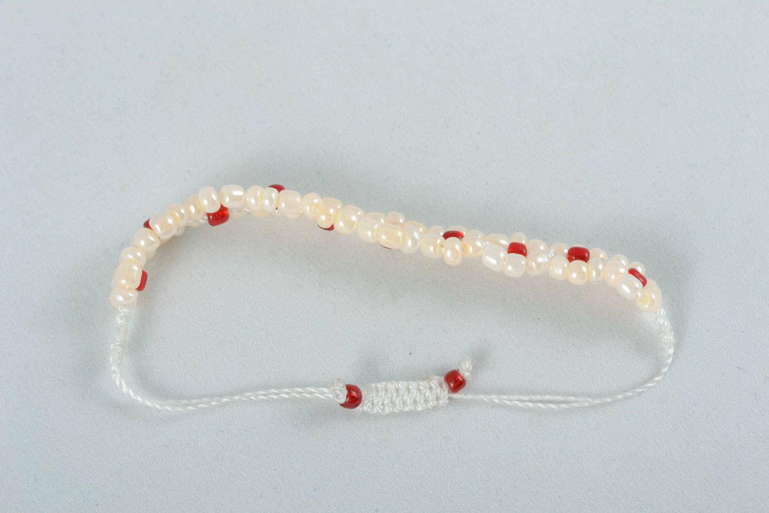 Tender white and red beads strand bracelet fon white cord for girl photo 3