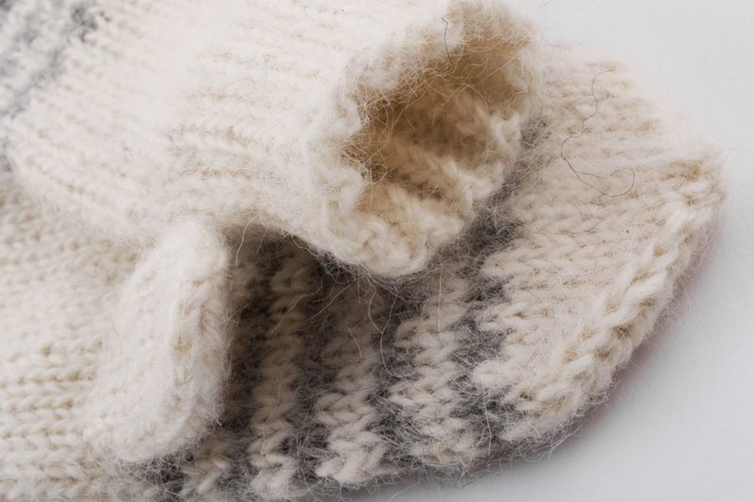White knitted mittens with grey ornament  photo 3