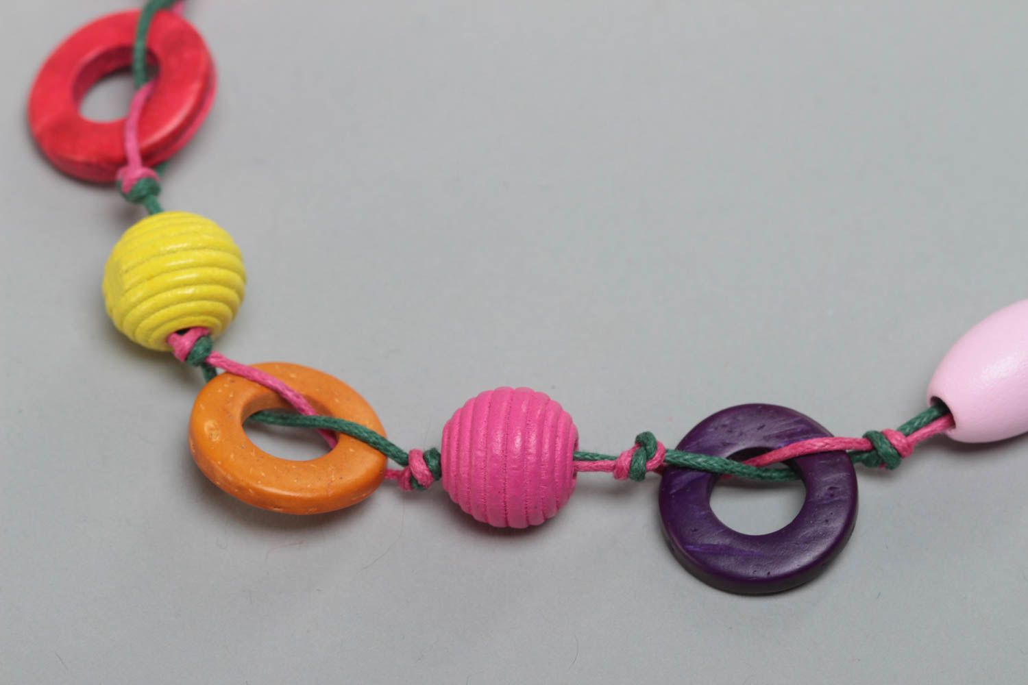 Beautiful bright necklace with wooden and coconut beads for children photo 3