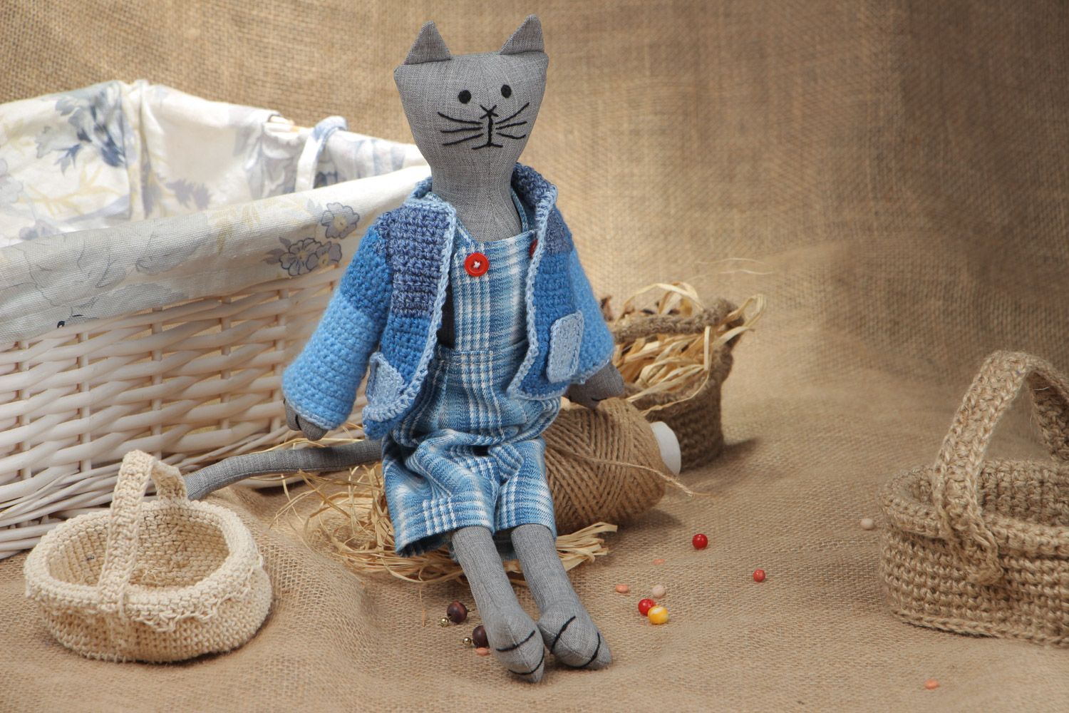 Handmade soft toy sewn of cotton cute gray cat in crocheted blue jacket photo 1
