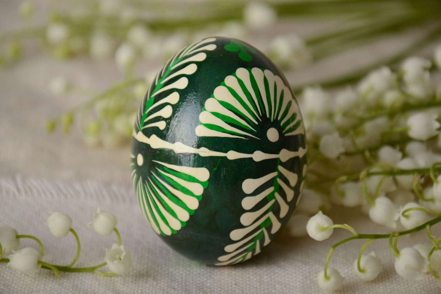 Handmade traditional decorative green painted Easter egg in Lemkiv style photo 1