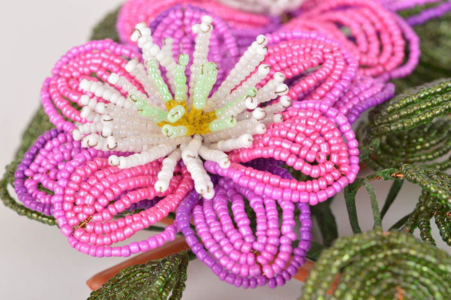 Beautiful homemade woven bead flowers for wall decor interior composition photo 4