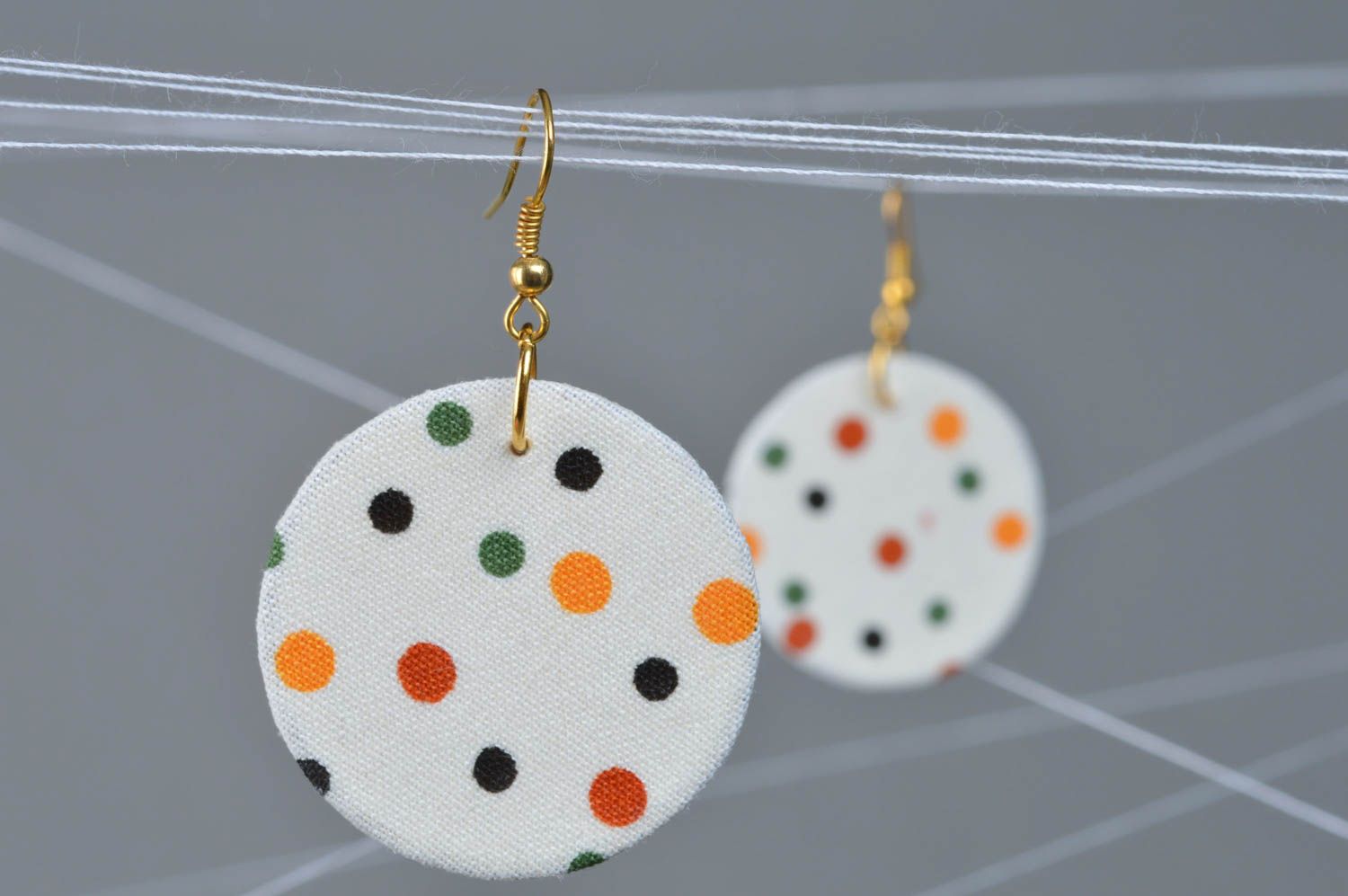 Beautiful handmade colorful dotted fabric round earrings of light color photo 1