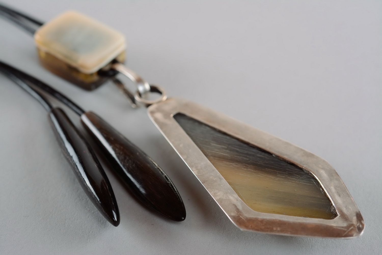 Pendant made of a cow horn photo 5