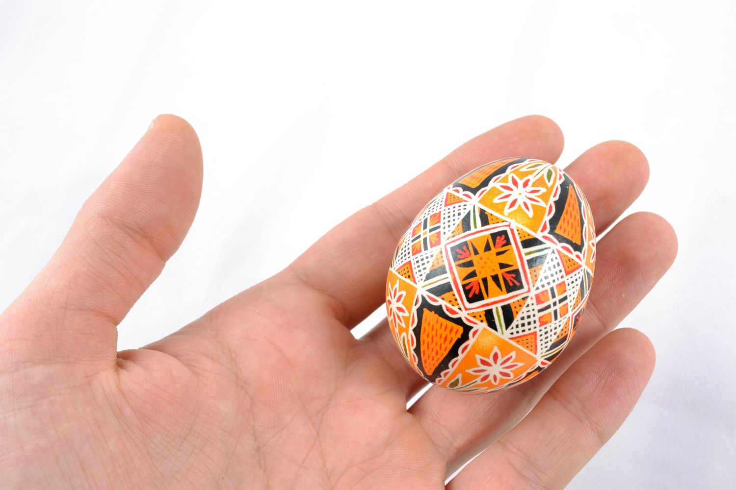 Beautiful painted Easter egg in ethnic style photo 2