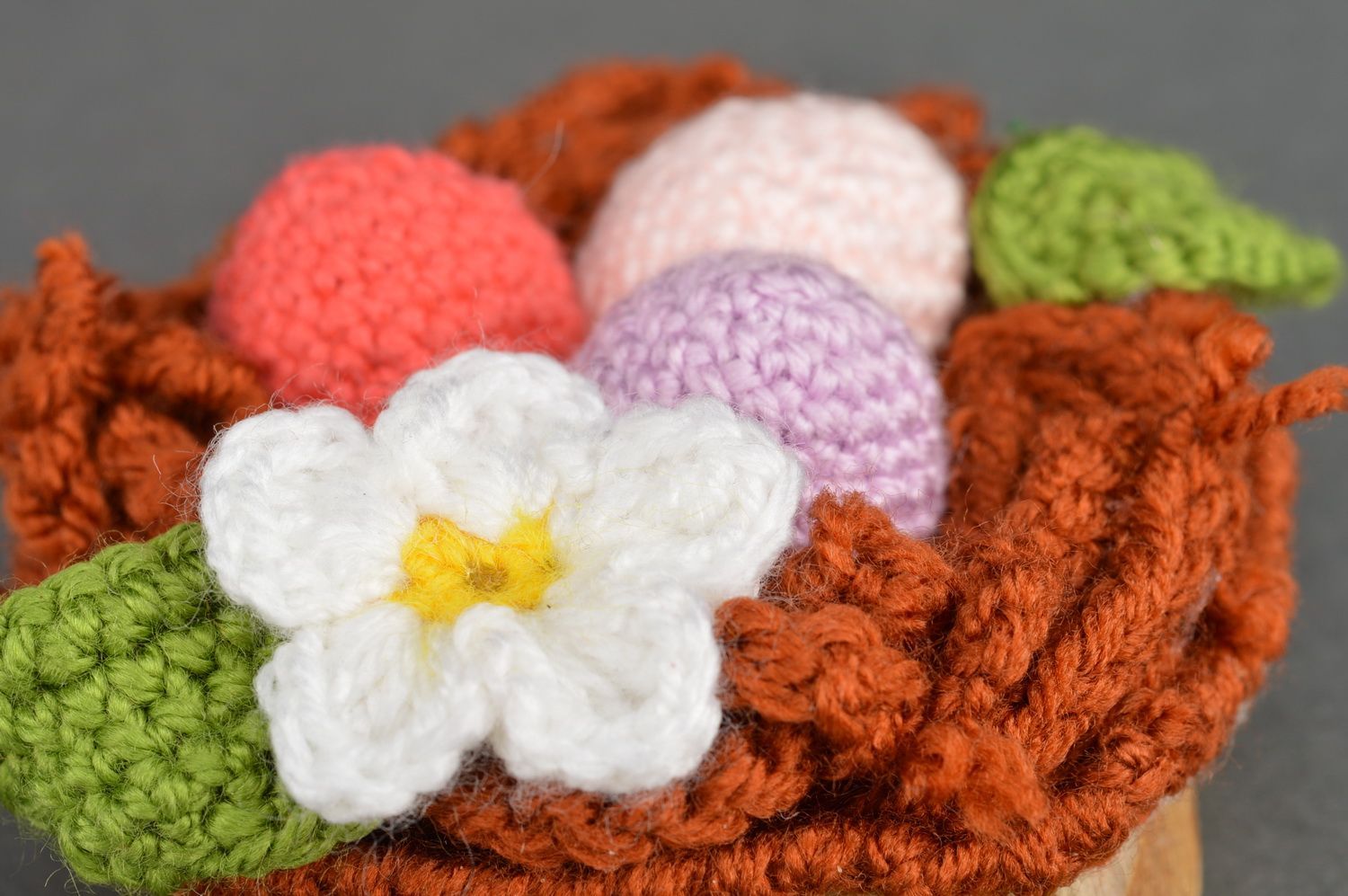 Handmade interior table decoration Easter basket crocheted with colorful eggs photo 5