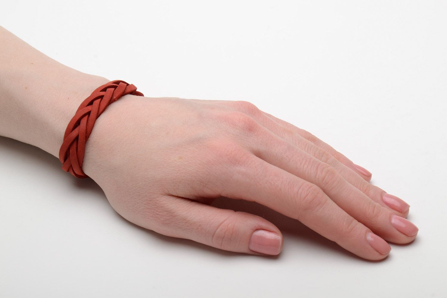 Thin elegant handmade wrist bracelet woven of red genuine leather for women photo 2