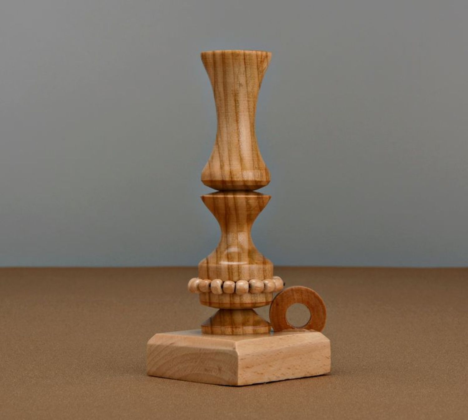 Candlestick for one candle made from cherry wood photo 1