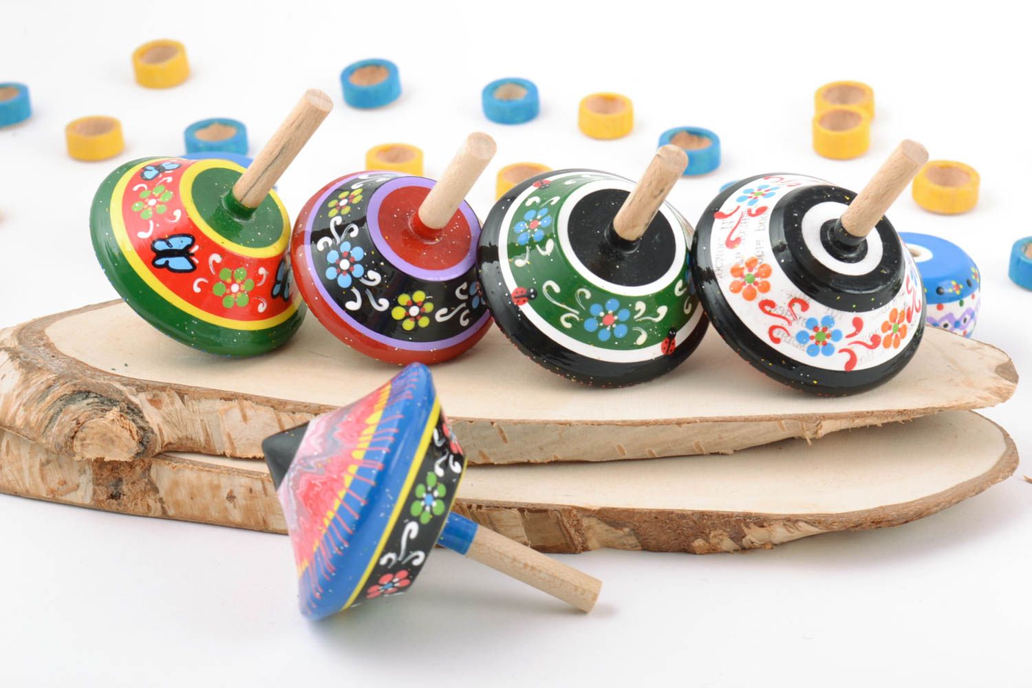Small handmade designer painted wooden spinning tops set 5 items children's toys photo 1