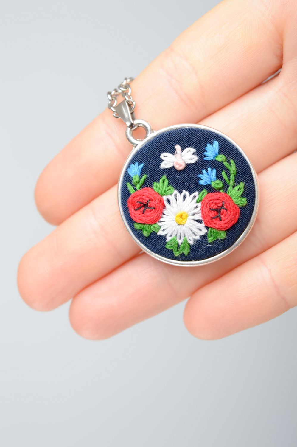 Handmade embroidered pendant with flowers photo 3