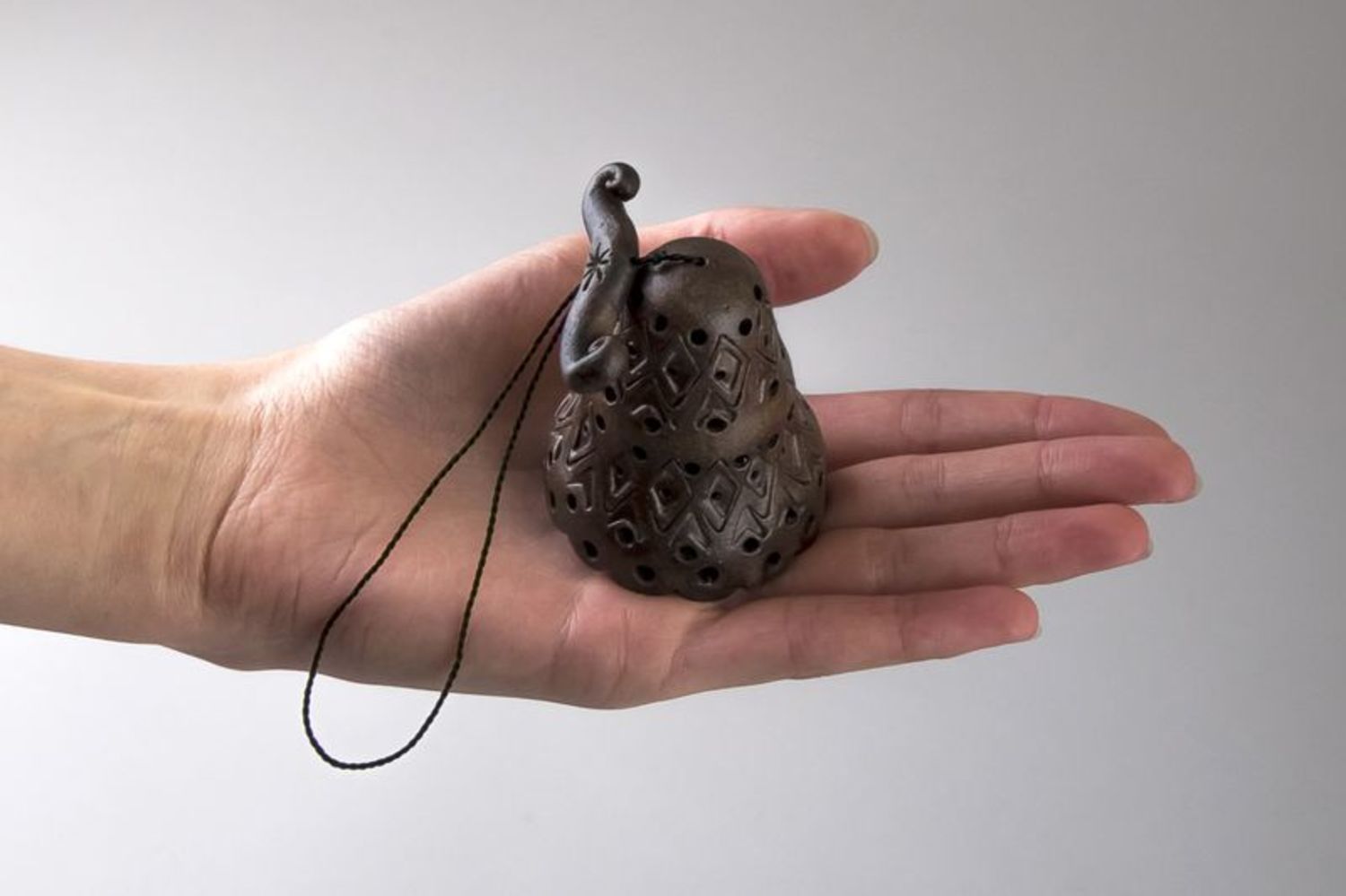 Ceramic bell on a rope photo 2
